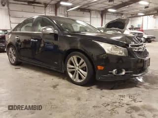 ✅ 2012 Chevrolet Cruze LTZ • VIN: 1G1PH5SC4C7158566 • Лот: 43390104. Опубликован ранее на IAAI с пробегом 146 750 миль. Бесплатный доступ к архиву аукционных продаж из США и подробный отчёт об истории автомобиля на DreamBid. Изображение 1.