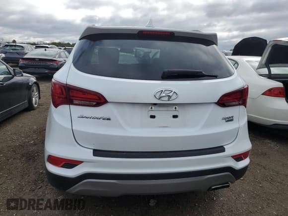 ✅ 2017 Hyundai Santa Fe 2.4L • VIN: 5NMZUDLB1HH032323 • Lot: 87479315. Listed on Copart with 88,380 mi. Free auction sales archive from the USA and detailed vehicle history report at DreamBid. Image 6.
