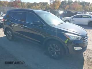 2015 Hyundai Santa Fe z VIN 5XYZU3LB7FG287589, wystawiony jako IAAI lot #43533870 z przebiegiem 208 143 mil mil oraz . Historia ofert i sprzedaży dostępna na DreamBid. Obrazek 1.