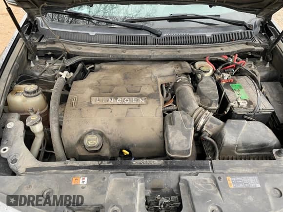 ✅ 2015 Lincoln MKT • VIN: 2LMHJ5NK9FBL03910 • Lot: 75082954. Wystawiony na Copart z przebiegiem 186 466 mil. Bezpłatny archiwum sprzedaży aukcyjnych z USA i szczegółowy raport historii pojazdu na DreamBid. Zdjęcie 7.