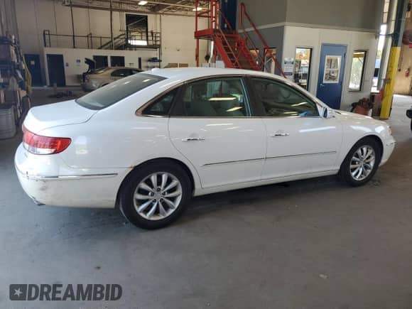 2008 Hyundai Azera Limited с VIN KMHFC46F88A290705, выставлен на аукционе Copart как лот 56882515 с пробегом 114 947 миль миль и Списание • Salvage title. История ставок и продаж доступна на DreamBid. Изображение 3.