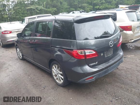 ✅ 2013 Mazda 5 Touring • VIN: JM1CW2CL8D0149999 • Lot: 42903215. Listed on IAAI with 103,051 mi. Free auction sales archive from the USA and detailed vehicle history report at DreamBid. Image 3.