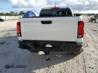 ✅ 2023 Chevrolet Colorado 4WD Trail Boss • VIN: 1GCPTEEKXP1198099 • Лот: 77568934. Опубликован ранее на Copart с пробегом 8 109 миль. Бесплатный доступ к архиву аукционных продаж из США и подробный отчёт об истории автомобиля на DreamBid. Изображение 6.