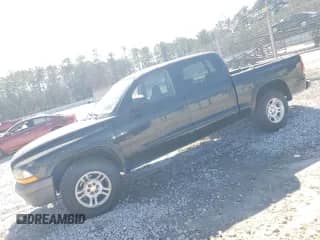 2003 Dodge Dakota Sport z VIN 1D7HL38X13S358851, wystawiony jako Copart lot #46395655 z przebiegiem 219 125 mil mil oraz Szkoda całkowita • Salvage title. Historia ofert i sprzedaży dostępna na DreamBid. Obrazek 1.