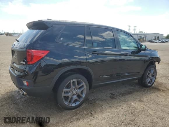 ✅ 2022 Honda Passport EX-L • VIN: 5FNYF8H53NB021918 • Lot: 61624245. Listed on Copart with 10,066 mi. Free auction sales archive from the USA and detailed vehicle history report at DreamBid. Image 3.