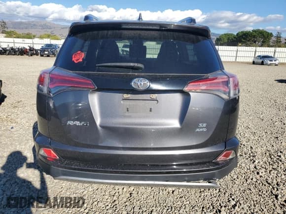 ✅ 2018 Toyota RAV4 SE • VIN: JTMJFREV0JJ212646 • Lot: 91848095. Listed on Copart with 78,060 mi. Free auction sales archive from the USA and detailed vehicle history report at DreamBid. Image 6.
