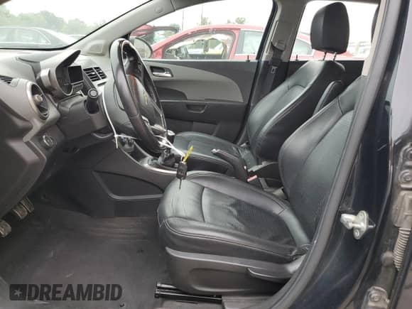 2013 Chevrolet Sonic LTZ с VIN 1G1JF6SB5D4152982, выставлен на аукционе Copart как лот 70643904 с пробегом 144 912 миль миль и Списание • Salvage title. История ставок и продаж доступна на DreamBid. Изображение 7.