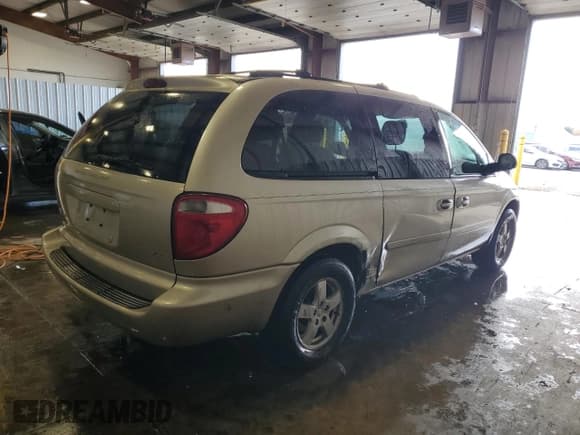 ✅ 2005 Dodge Caravan SXT • VIN: 2D4GP44L95R240475 • Лот: 86502335. Опубликован ранее на Copart с пробегом 124 710 миль. Бесплатный доступ к архиву аукционных продаж из США и подробный отчёт об истории автомобиля на DreamBid. Изображение 3.