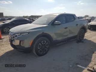 2024 Hyundai Santa Cruz SEL z VIN 5NTJBDDE6RH111147, wystawiony jako Copart lot #85324075 z przebiegiem 6 500 mil mil oraz Szkoda całkowita • Salvage title. Historia ofert i sprzedaży dostępna na DreamBid. Obrazek 1.