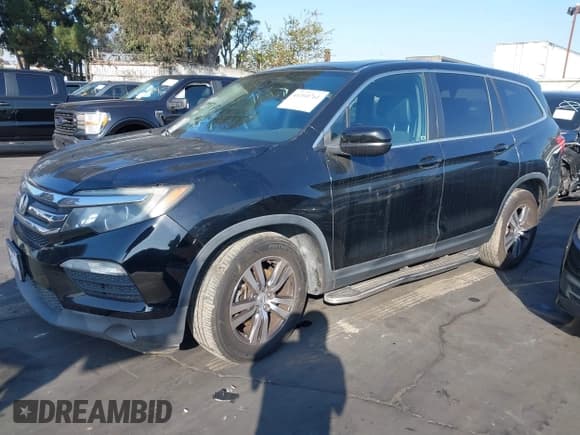 ✅ 2017 Honda Pilot EX-L • VIN: 5FNYF5H76HB009198 • Lot: 41360761. Listed on IAAI with 108,719 mi. Free auction sales archive from the USA and detailed vehicle history report at DreamBid. Image 18.