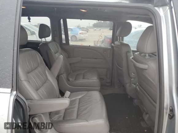 ✅ 2010 Honda Odyssey EX-L • VIN: 5FNRL3H79AB035026 • Lot: 45910525. Listed on Copart with 133,818 mi. Free auction sales archive from the USA and detailed vehicle history report at DreamBid. Image 11.