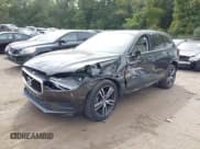 ✅ 2018 Volvo XC60 Momentum • VIN: LYV102RK4JB082162 • Lot: 43233964. Listed on IAAI with 66,835 mi. Free auction sales archive from the USA and detailed vehicle history report at DreamBid. Image 18.