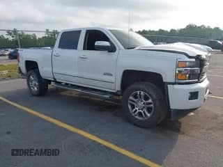 ✅ 2015 Chevrolet Silverado 2500HD High Country • VIN: 1GC1KXE83FF681914 • Lot: 42417459. Wystawiony na IAAI z przebiegiem 191 516 mil. Bezpłatny archiwum sprzedaży aukcyjnych z USA i szczegółowy raport historii pojazdu na DreamBid. Zdjęcie 1.