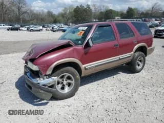 ✅ 2000 Chevrolet Blazer LT • VIN: 1GNCS13WXY2359604 • Лот: 51318755. Опубликован ранее на Copart с пробегом 190 803 миль. Бесплатный доступ к архиву аукционных продаж из США и подробный отчёт об истории автомобиля на DreamBid. Изображение 1.