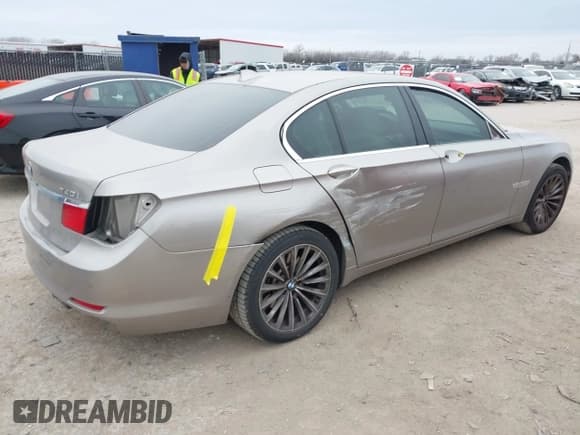 ✅ 2012 BMW 7 Series 740i • VIN: WBAKA4C51CC613670 • Lot: 41582639. Listed on IAAI with 149,753 mi. Free auction sales archive from the USA and detailed vehicle history report at DreamBid. Image 4.
