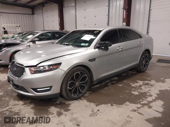 ✅ 2016 Ford Taurus SHO • VIN: 1FAHP2KT1GG111195 • Lot: 43757639. Listed on IAAI with 152,670 mi. Free auction sales archive from the USA and detailed vehicle history report at DreamBid. Image 2.