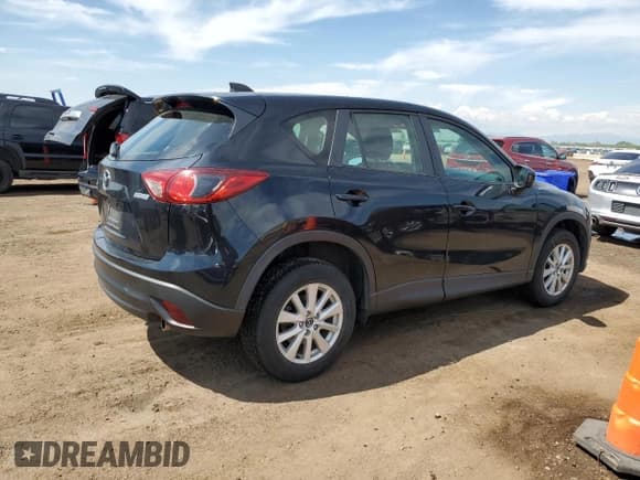 ✅ 2014 Mazda CX-5 Sport • VIN: JM3KE2BE0E0335126 • Lot: 56555315. Listed on Copart with 116,718 mi. Free auction sales archive from the USA and detailed vehicle history report at DreamBid. Image 3.