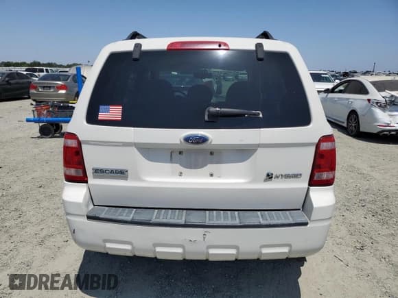 ✅ 2009 Ford Escape Hybrid • VIN: 1FMCU49359KA25561 • Lot: 59199755. Listed on Copart with 100,258 mi. Free auction sales archive from the USA and detailed vehicle history report at DreamBid. Image 6.