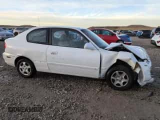 2004 Hyundai Accent GL z VIN KMHCG35C94U310459, wystawiony jako Copart lot #79477194 z przebiegiem 86 942 mil mil oraz Szkoda całkowita • Salvage title. Historia ofert i sprzedaży dostępna na DreamBid. Obrazek 4.