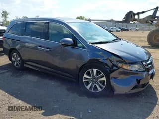 ✅ 2016 Honda Odyssey Touring Elite • VIN: 5FNRL5H93GB007597 • Lot: 43248601. Listed on IAAI with 74,102 mi. Free auction sales archive from the USA and detailed vehicle history report at DreamBid. Image 1.