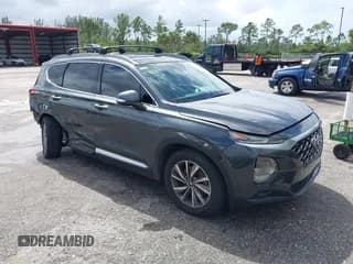 ✅ 2020 Hyundai Santa Fe SEL • VIN: 5NMS33AD4LH212861 • Lot: 43377265. Listed on IAAI with 84,950 mi. Free auction sales archive from the USA and detailed vehicle history report at DreamBid. Image 1.