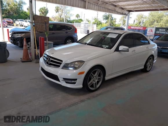 ✅ 2014 Mercedes-Benz C 250 Sport • VIN: WDDGF4HB3EG234633 • Lot: 43600804. Listed on IAAI with 131,529 mi. Free auction sales archive from the USA and detailed vehicle history report at DreamBid. Image 2.