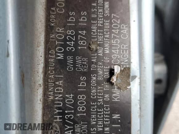 2004 Hyundai Accent GL z VIN KMHCG45C94U574027, wystawiony jako Copart lot #57463905 z przebiegiem 139 595 mil mil oraz Szkoda całkowita • Salvage title. Historia ofert i sprzedaży dostępna na DreamBid. Obrazek 13.