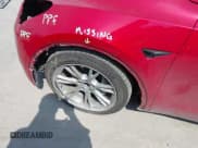 ✅ 2023 Tesla Model Y Long Range • VIN: 7SAYGAEE7PF691499 • Lot: 42038850. Listed on IAAI with 26,439 mi. Free auction sales archive from the USA and detailed vehicle history report at DreamBid. Image 24.