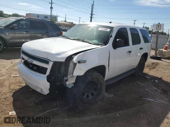 2011 Chevrolet Tahoe Commercial with VIN 1GNSK2E05BR259970, listed as a Copart auction lot 71519905 with 285,961 mi miles and Salvage title. Bid and sale history available at DreamBid. Image 1.