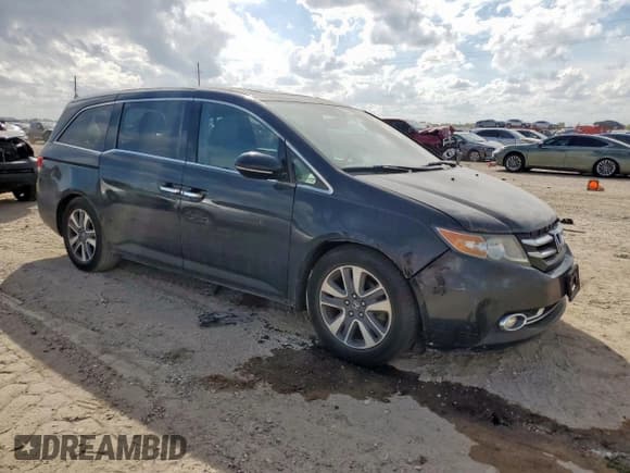 ✅ 2014 Honda Odyssey Touring • VIN: 5FNRL5H94EB008352 • Лот: 93009655. Опубликован ранее на Copart с пробегом 138 878 миль. Бесплатный доступ к архиву аукционных продаж из США и подробный отчёт об истории автомобиля на DreamBid. Изображение 4.