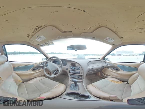 ✅ 1997 Mercury Cougar • VIN: 1MELM6245VH603795 • Лот: 70293355. Опубликован ранее на Copart с пробегом 99 536 миль. Бесплатный доступ к архиву аукционных продаж из США и подробный отчёт об истории автомобиля на DreamBid. Изображение 14.