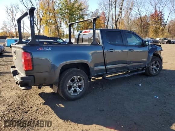 ✅ 2019 Chevrolet Colorado 4WD Z71 • VIN: 1GCGTDEN7K1132221 • Лот: 76713234. Опубликован ранее на Copart с пробегом 129 185 миль. Бесплатный доступ к архиву аукционных продаж из США и подробный отчёт об истории автомобиля на DreamBid. Изображение 3.