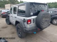 ✅ 2023 Jeep Wrangler • VIN: 1C4JJXN67PW691008 • Lot: 42641377. Wystawiony na IAAI z przebiegiem 22 985 mil. Bezpłatny archiwum sprzedaży aukcyjnych z USA i szczegółowy raport historii pojazdu na DreamBid. Zdjęcie 3.