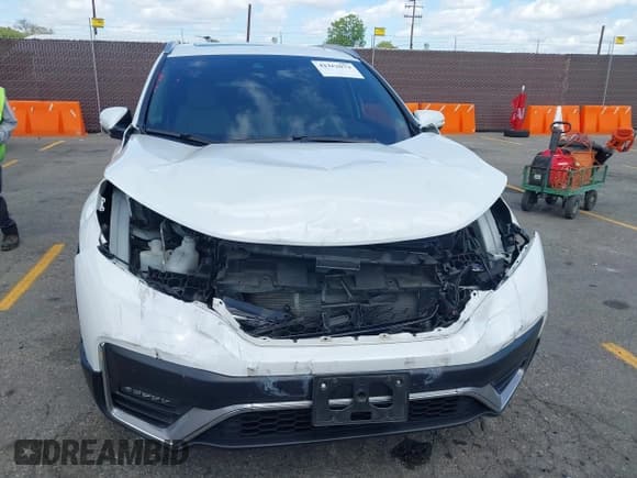 ✅ 2020 Honda CR-V Touring • VIN: 7FART6H97LE023225 • Lot: 42262074. Listed on IAAI with 46,194 mi. Free auction sales archive from the USA and detailed vehicle history report at DreamBid. Image 12.