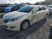 ✅ 2015 Lincoln MKZ Hybrid • VIN: 3LN6L2LU1FR609128 • Lot: 82256535. Wystawiony na Copart z przebiegiem 187 699 mil. Bezpłatny archiwum sprzedaży aukcyjnych z USA i szczegółowy raport historii pojazdu na DreamBid. Zdjęcie 1.