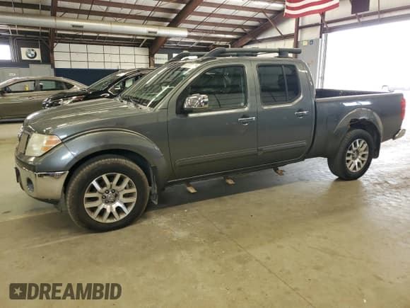 ✅ 2009 Nissan Frontier SE • VIN: 1N6AD09W49C413211 • Lot: 57777185. Listed on Copart with 210,839 mi. Free auction sales archive from the USA and detailed vehicle history report at DreamBid. Image 1.