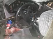 ✅ 1991 Mitsubishi Eclipse • VIN: 4A3CS54U5ME034104 • Lot: 82414954. Wystawiony na Copart z przebiegiem 474 141 mil. Bezpłatny archiwum sprzedaży aukcyjnych z USA i szczegółowy raport historii pojazdu na DreamBid. Zdjęcie 8.