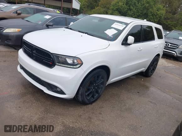 2017 Dodge Durango R/T with VIN 1C4SDHCT1HC651102, listed as a IAAI auction lot 43524736 with 206,293 mi miles and . Bid and sale history available at DreamBid. Image 2.