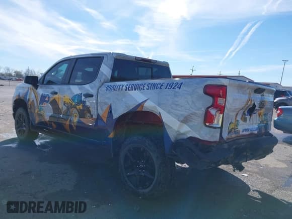 ✅ 2023 Chevrolet Silverado 1500 LT Trail Boss • VIN: 3GCUDFED3PG197885 • Lot: 41733427. Wystawiony na IAAI z przebiegiem 64 911 mil. Bezpłatny archiwum sprzedaży aukcyjnych z USA i szczegółowy raport historii pojazdu na DreamBid. Zdjęcie 3.