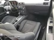 ✅ 2012 Dodge Challenger SXT • VIN: 2C3CDYAGXCH124888 • Lot: 82641564. Wystawiony na Copart z przebiegiem 120 448 mil. Bezpłatny archiwum sprzedaży aukcyjnych z USA i szczegółowy raport historii pojazdu na DreamBid. Zdjęcie 8.