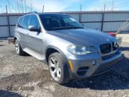✅ 2012 BMW X5 35d • VIN: 5UXZW0C59CL663582 • Lot: 43671625. Listed on IAAI with 193,230 mi. Free auction sales archive from the USA and detailed vehicle history report at DreamBid. Image 1.