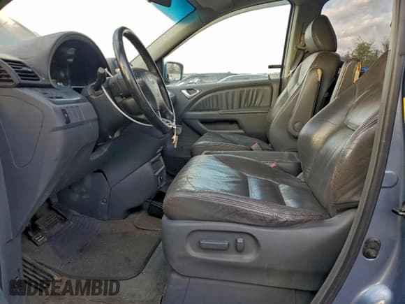 ✅ 2006 Honda Odyssey EX-L • VIN: 5FNRL38776B070297 • Лот: 95570655. Опубликован ранее на Copart с пробегом 124 763 миль. Бесплатный доступ к архиву аукционных продаж из США и подробный отчёт об истории автомобиля на DreamBid. Изображение 7.