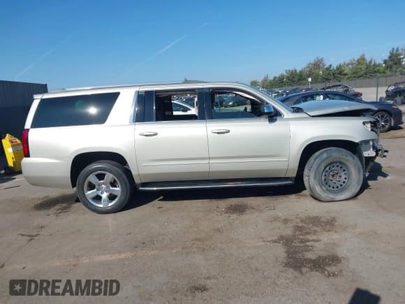 ✅ 2015 Chevrolet Suburban LTZ • VIN: 1GNSCKKC5FR258304 • Lot: 43566622. Listed on IAAI with 155,144 mi. Free auction sales archive from the USA and detailed vehicle history report at DreamBid. Image 14.