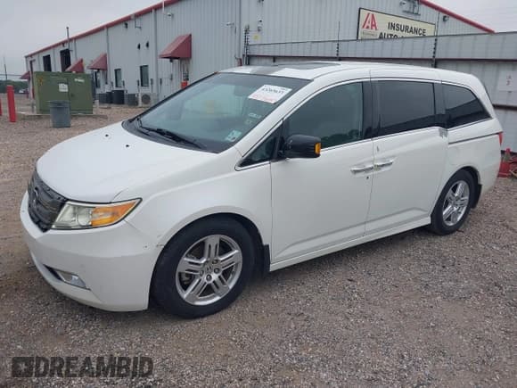 ✅ 2012 Honda Odyssey Touring • VIN: 5FNRL5H96CB093885 • Лот: 43265633. Опубликован ранее на IAAI с пробегом 198 087 миль. Бесплатный доступ к архиву аукционных продаж из США и подробный отчёт об истории автомобиля на DreamBid. Изображение 2.