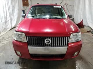 ✅ 2007 Mercury Mariner Luxury • VIN: 4M2YU91197KJ07897 • Лот: 80833214. Опубликован ранее на Copart с пробегом 71 729 миль. Бесплатный доступ к архиву аукционных продаж из США и подробный отчёт об истории автомобиля на DreamBid. Изображение 5.