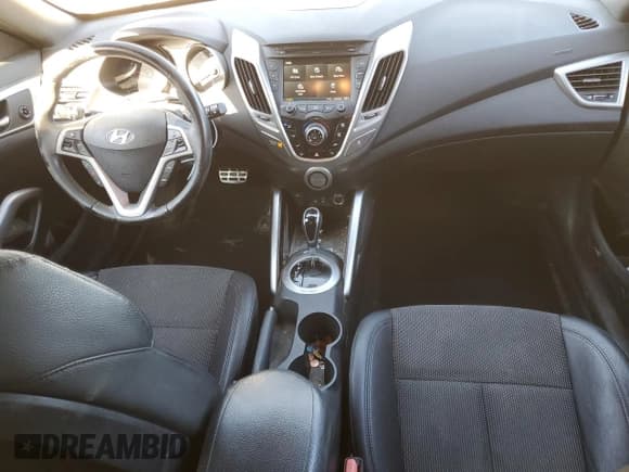 ✅ 2016 Hyundai Veloster • VIN: KMHTC6ADXGU302676 • Lot: 42196865. Wystawiony na Copart z przebiegiem 77 285 mil. Bezpłatny archiwum sprzedaży aukcyjnych z USA i szczegółowy raport historii pojazdu na DreamBid. Zdjęcie 8.