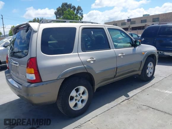 ✅ 2002 Mazda Tribute LX • VIN: 4F2YU09172KM36435 • Lot: 42255598. Wystawiony na IAAI z przebiegiem 120 860 mil. Bezpłatny archiwum sprzedaży aukcyjnych z USA i szczegółowy raport historii pojazdu na DreamBid. Zdjęcie 4.