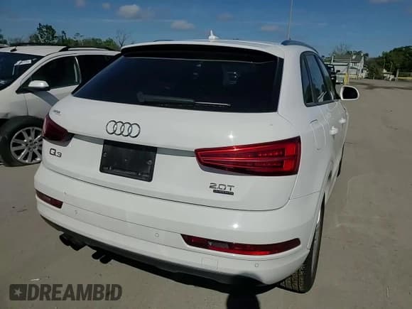 ✅ 2018 Audi Q3 Premium • VIN: WA1ECCFS7JR022494 • Lot: 81832255. Wystawiony na Copart z przebiegiem 85 461 mil. Bezpłatny archiwum sprzedaży aukcyjnych z USA i szczegółowy raport historii pojazdu na DreamBid. Zdjęcie 14.