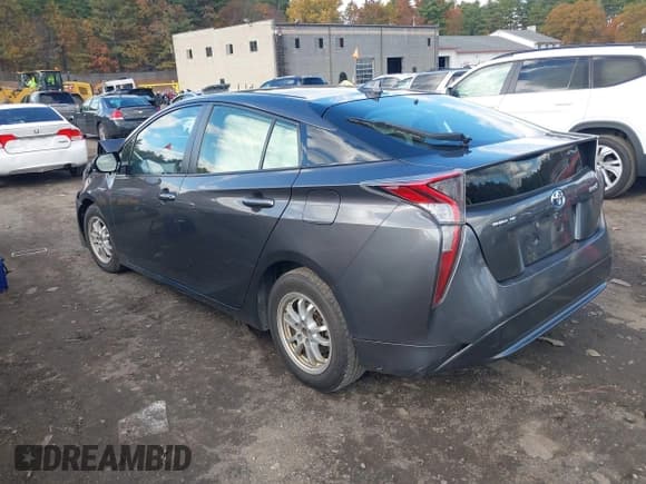 ✅ 2016 Toyota Prius Four • VIN: JTDKARFU7G3501142 • Lot: 43487711. Listed on IAAI with 133,239 mi. Free auction sales archive from the USA and detailed vehicle history report at DreamBid. Image 14.