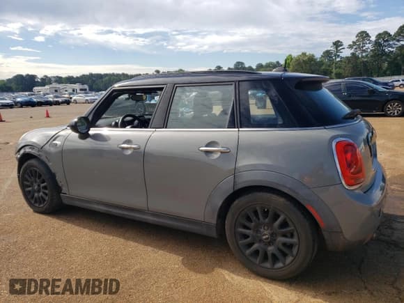 ✅ 2016 MINI Hardtop 4 Door • VIN: WMWXU1C51G2D09247 • Lot: 56202015. Listed on Copart with 64,367 mi. Free auction sales archive from the USA and detailed vehicle history report at DreamBid. Image 2.